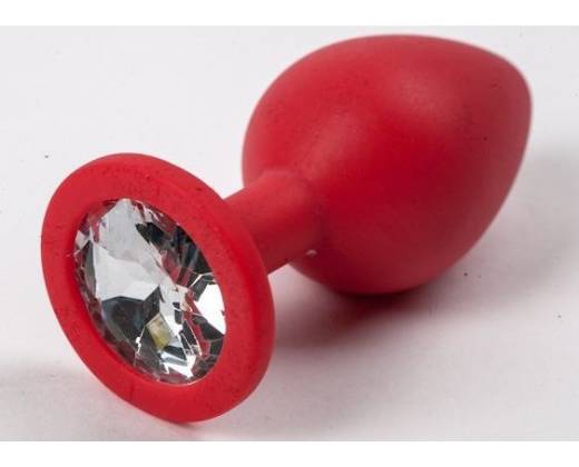 Красная анальная втулка с прозрачным кристаллом - 7,3 см.