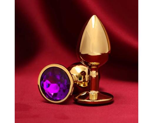 Золотистая анальная пробка с фиолетовым кристаллом