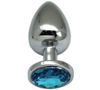 Серебристая анальная пробка с голубым кристаллом - 9 см.