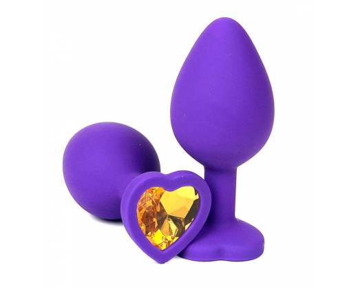Фиолетовая силиконовая анальная пробка с оранжевым стразом-сердцем - 8,5 см.