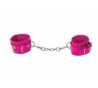 Розовые кожаные наручники с заклепками