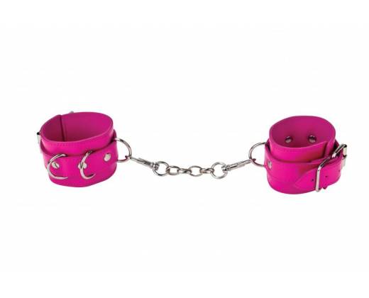 Розовые кожаные наручники с заклепками